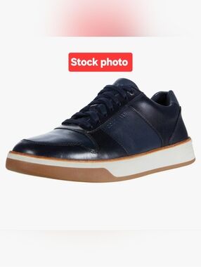 Cole Haan Men's Grand  Leather Lace-Up Sneaker in Navy and White.